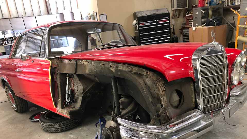 After repair: Completely restored classic car with factory-quality bodywork and fresh paint