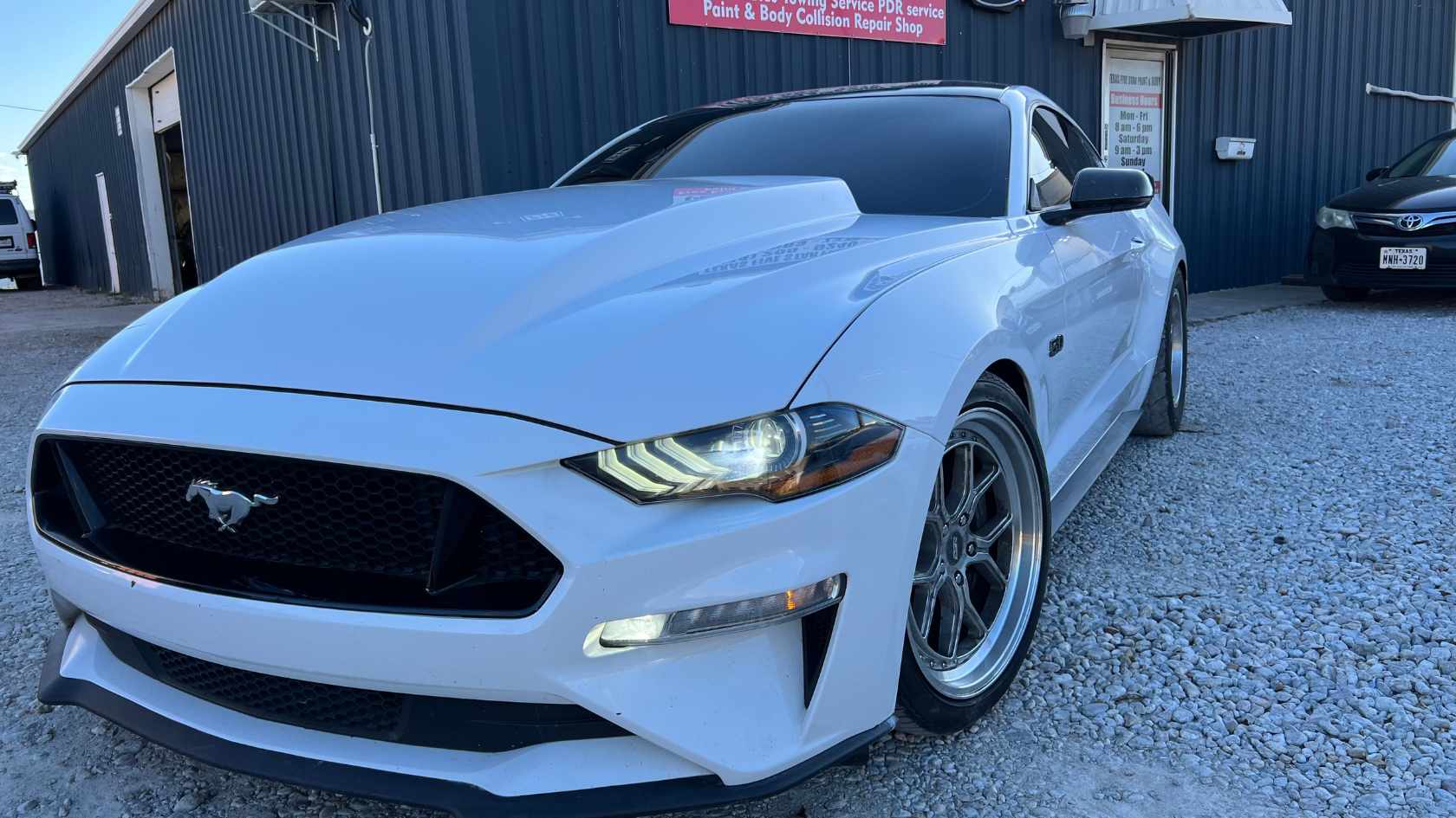 High-performance vehicle with custom body modifications and flawless paint matching.