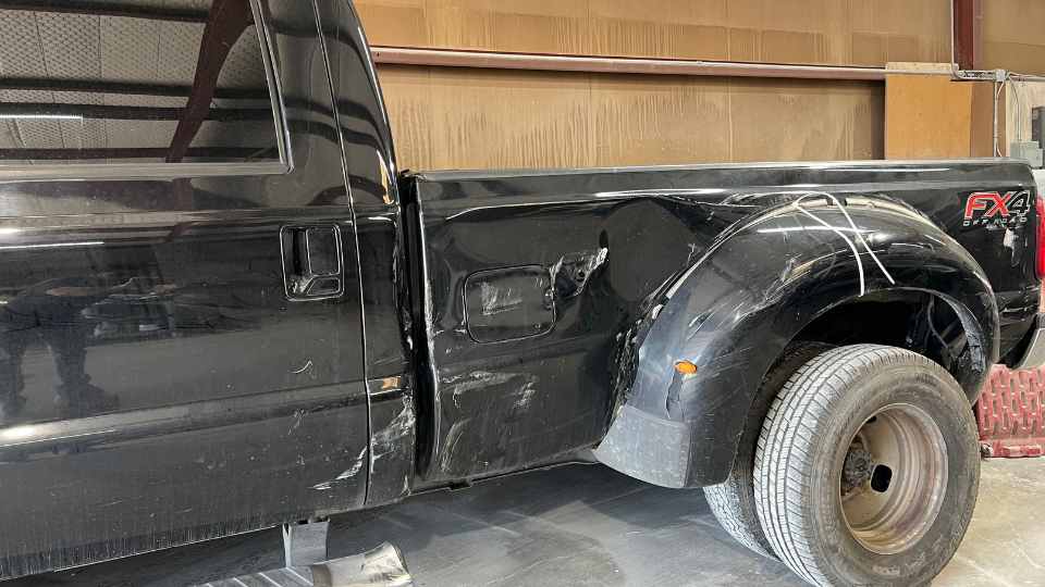 After repair: Restored truck bed with fresh paint and auto body work completed in Texas