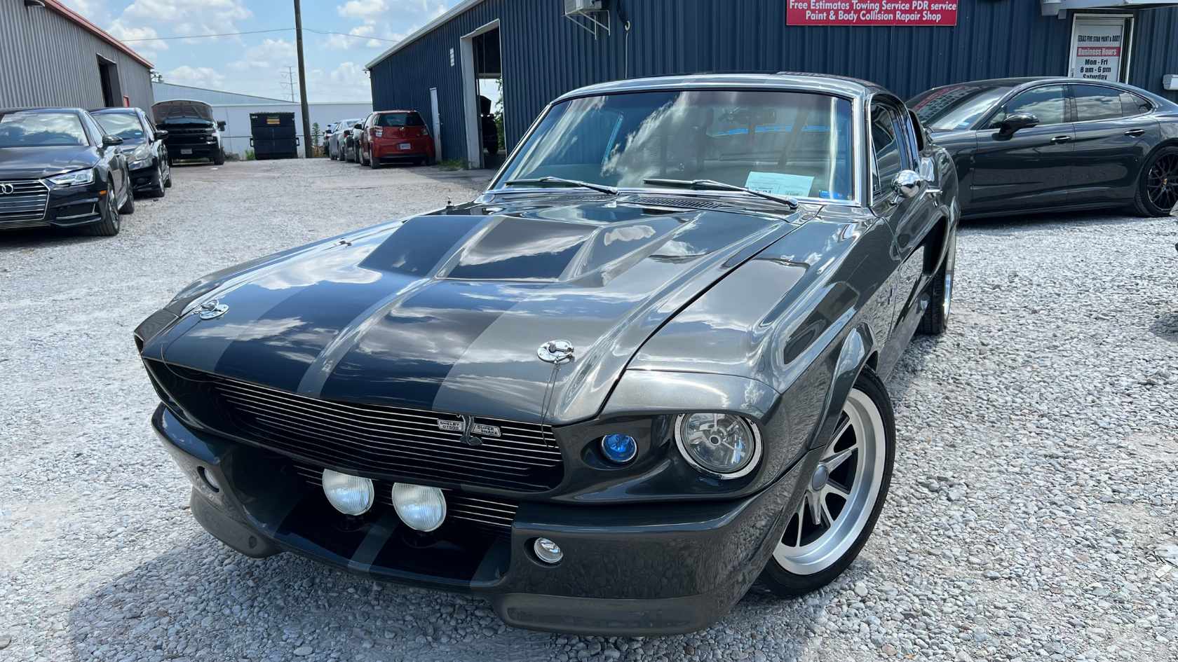 Classic American muscle car with a new custom red paint finish restored in Garland.