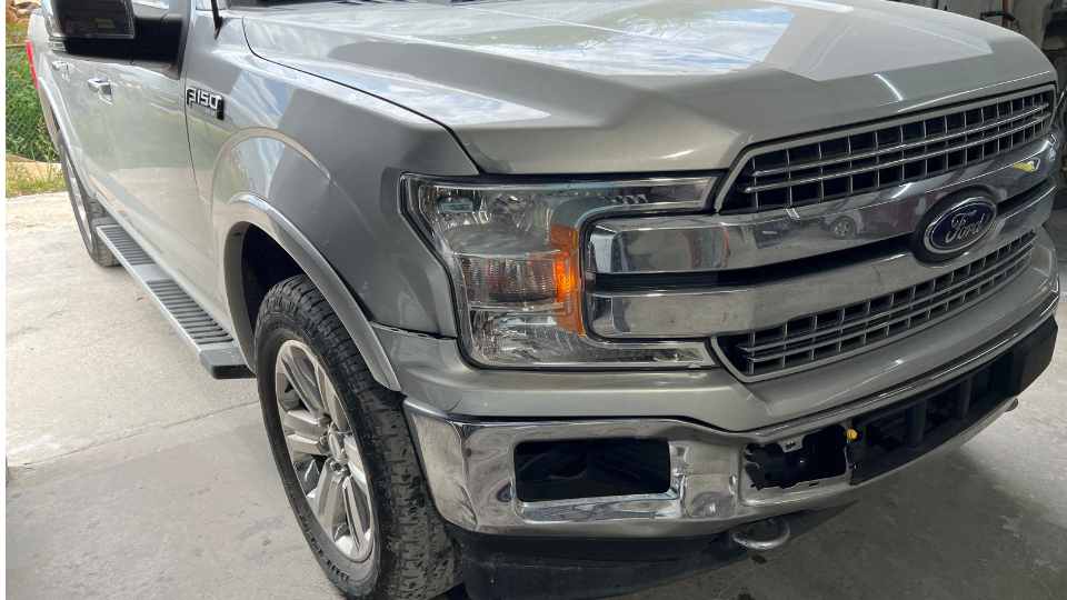 After repair: Fully repaired rear end with custom styling conversion and paint matching