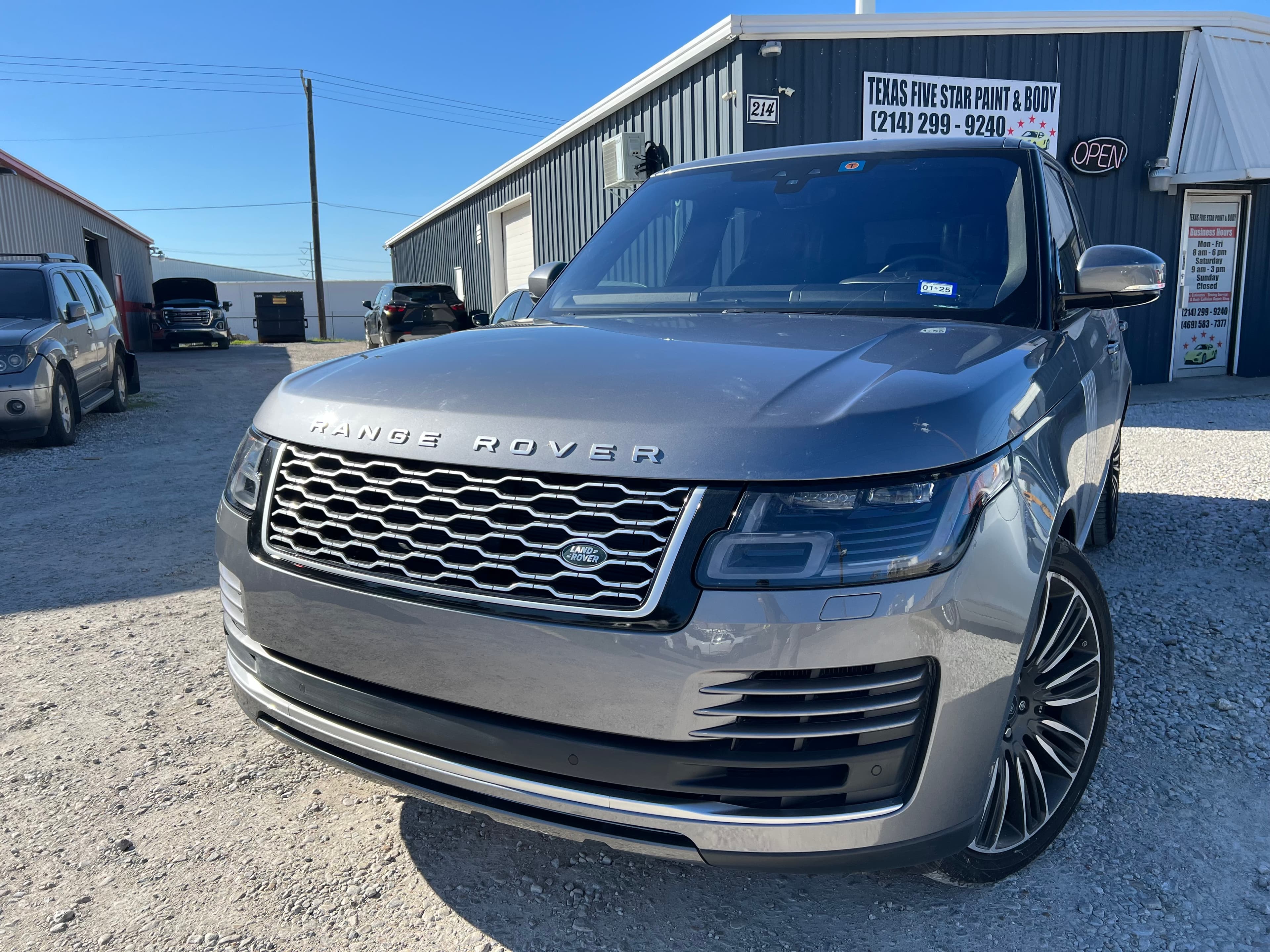 Range Rover parked outside Texas Five Star Paint & Body shop in Garland, TX